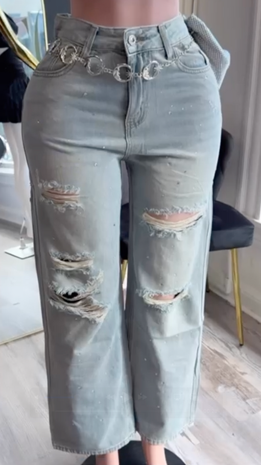 Jeans wide leg rasgados con strass
