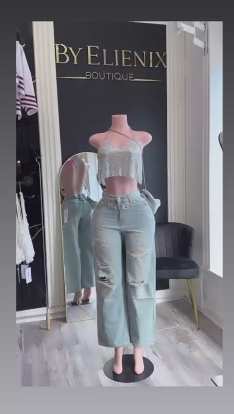 Jeans wide leg rasgados con strass